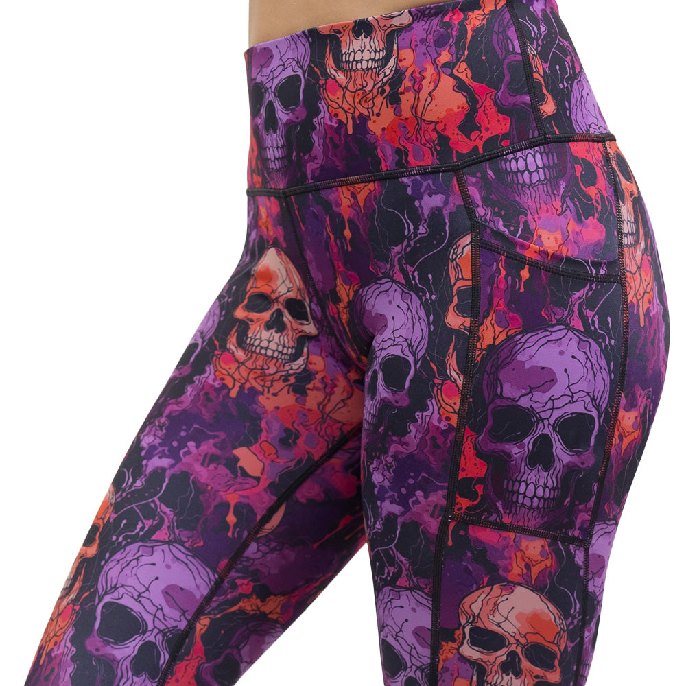 purple and orange skull patterned leggings