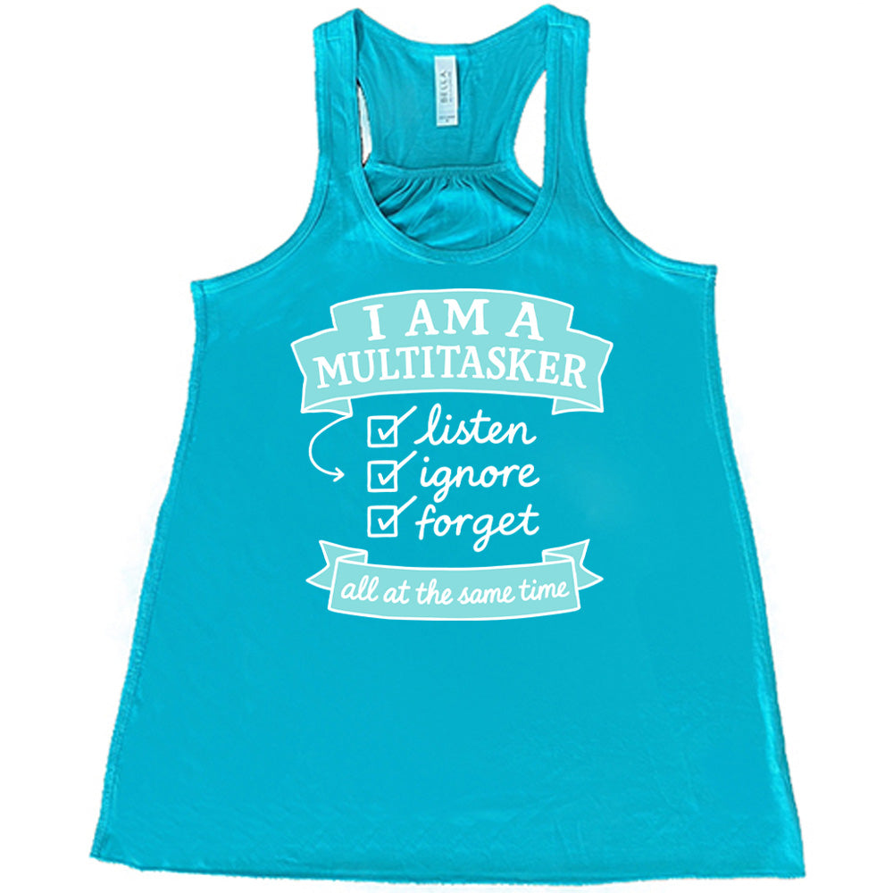 Teal Flowy Tank, with wording I am a Multitasker listen ignore forget all at the same time, with checkmarks an arrow and banners