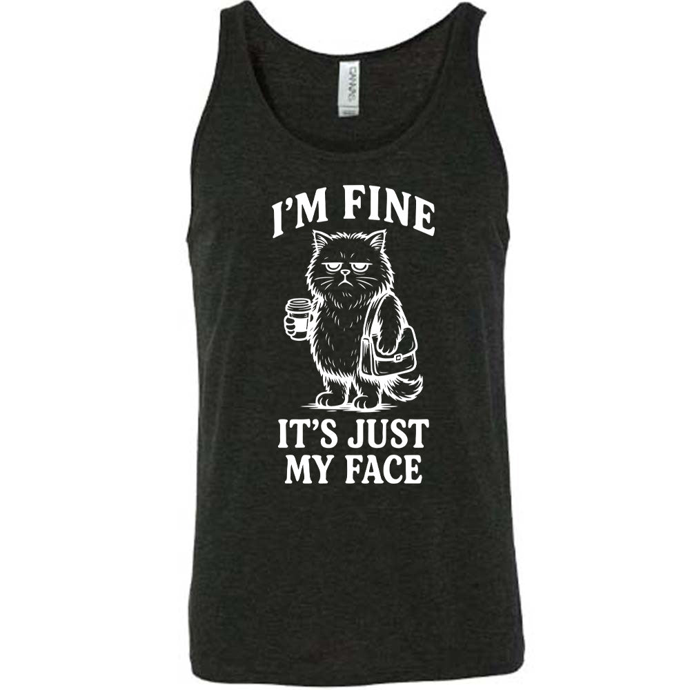 black unisex tank with the words "I'm fine it's just my face" on it, around the graphic of a cat with a resting-grumpy face, holding a coffee and wearing a purse