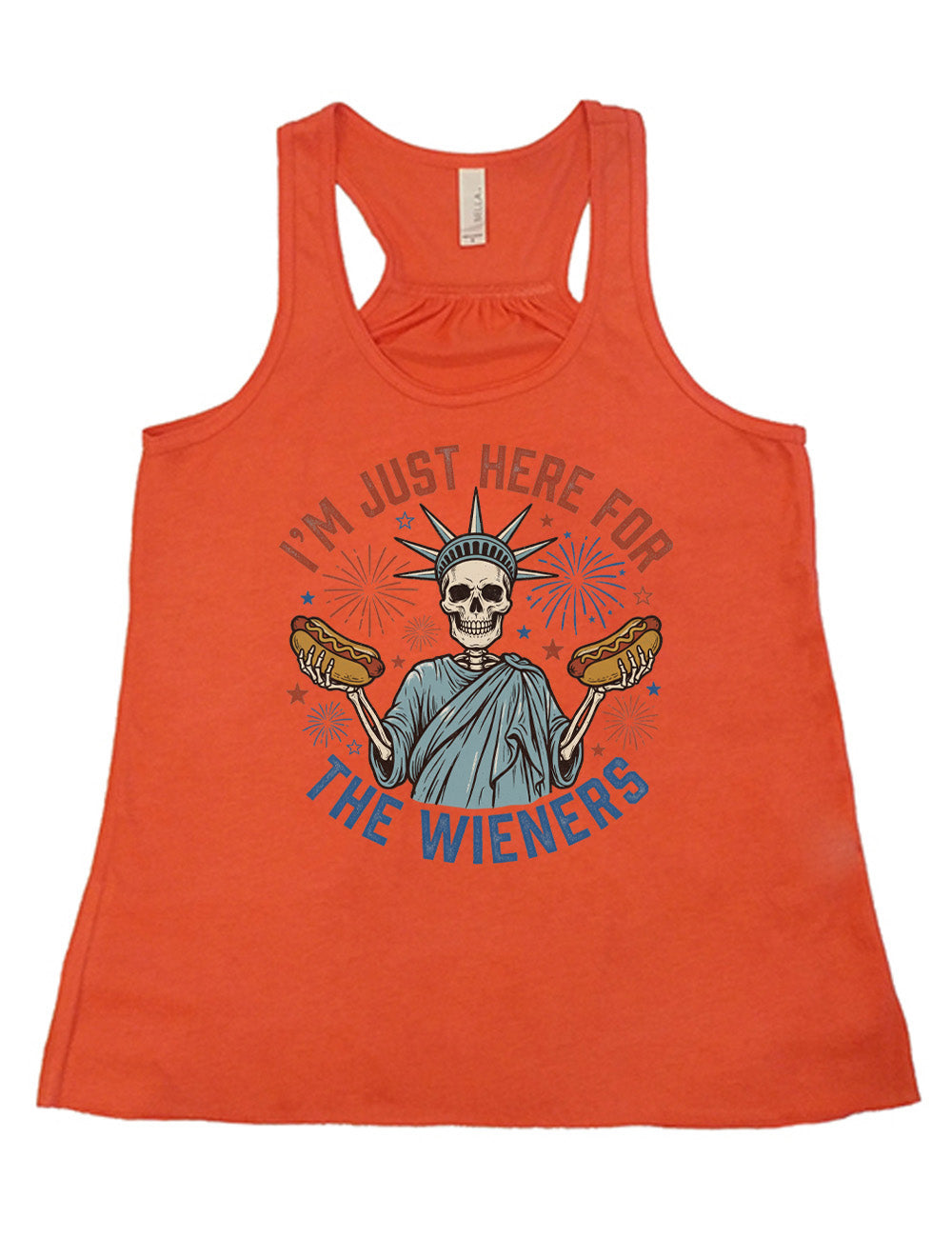 coral flowy racerback tank with the words "I'm just here for the wieners" on it, with the graphic in the middle of the words of a skeletal statue of liberty with a hotdog in each hand and fireworks and stars around it