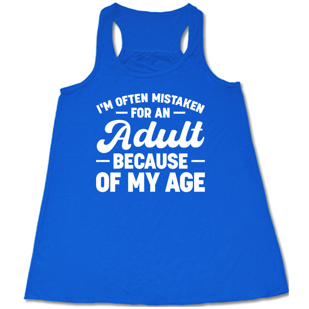 blue flowy tank with the words "I'm often mistaken for an adult because of my age" on it