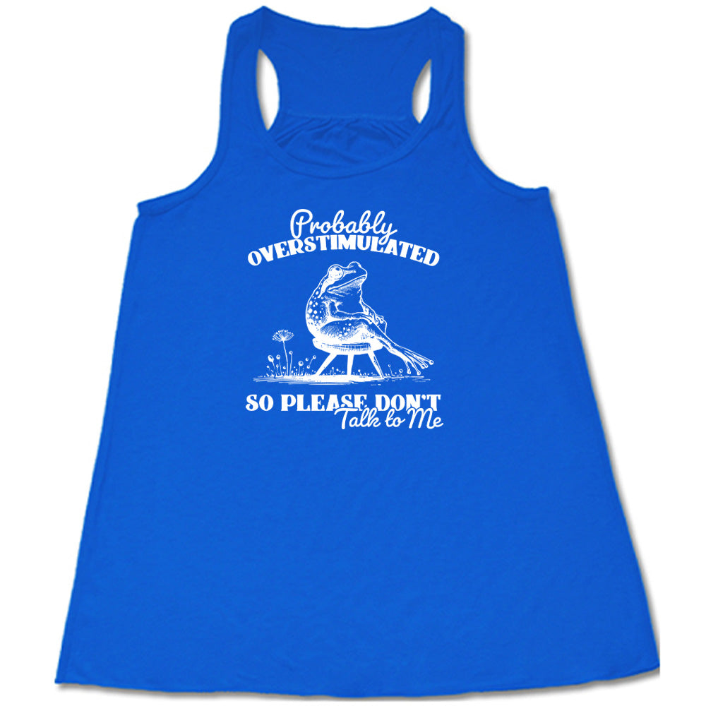 Blue colored flowy tank with a frog on a chair graphic on it that says "Probably Overstimulated So Please Don't Talk to Me"
