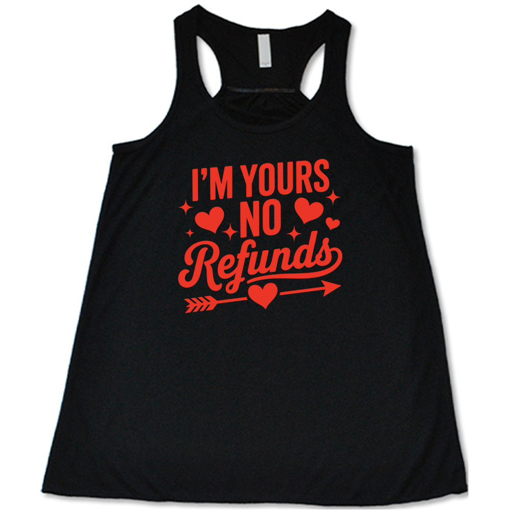 black shirt with the text "I'm Yours, No Refunds" on it