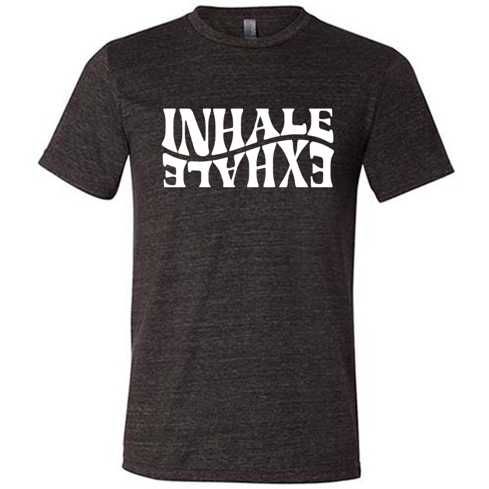 Black unisex tee with the words "inhale exhale" on it, with the word "exhale" upside down and backwards, giving almost a yin and yang effect