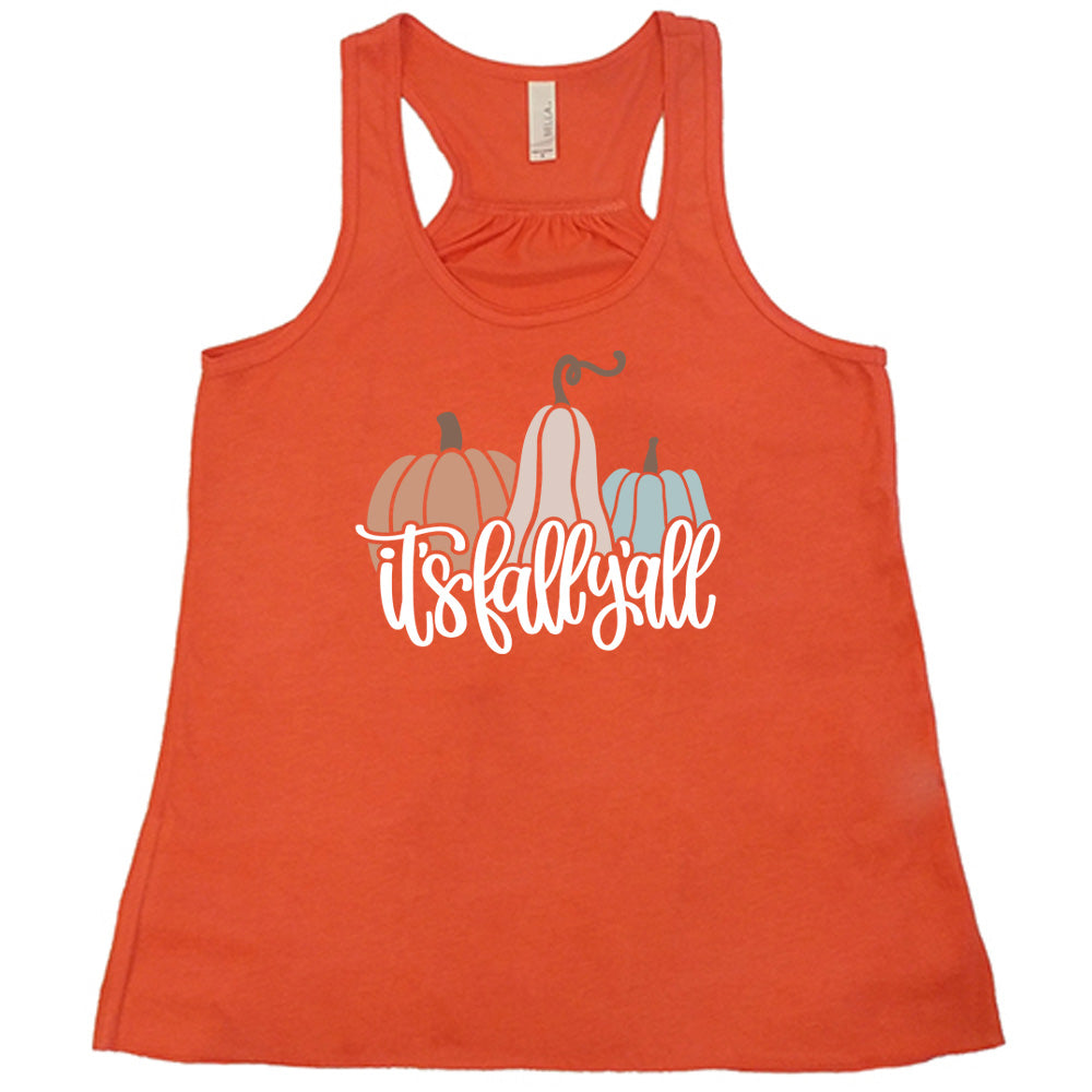 Coral colored flowy tank with pumpkin and gourd graphic on it that says "It's Fall Y'all"