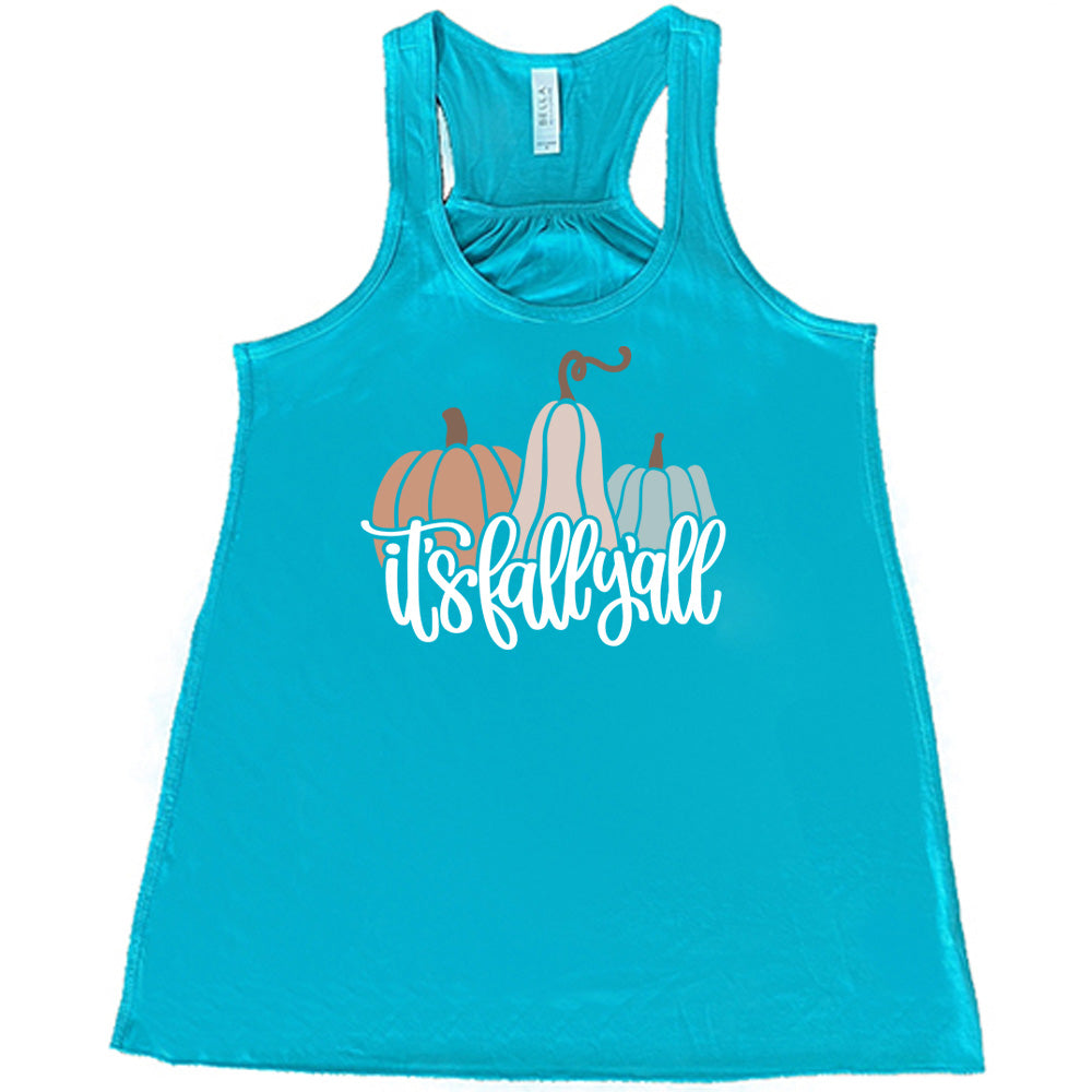 Teal colored flowy tank with pumpkin and gourd graphic on it that says "It's Fall Y'all"