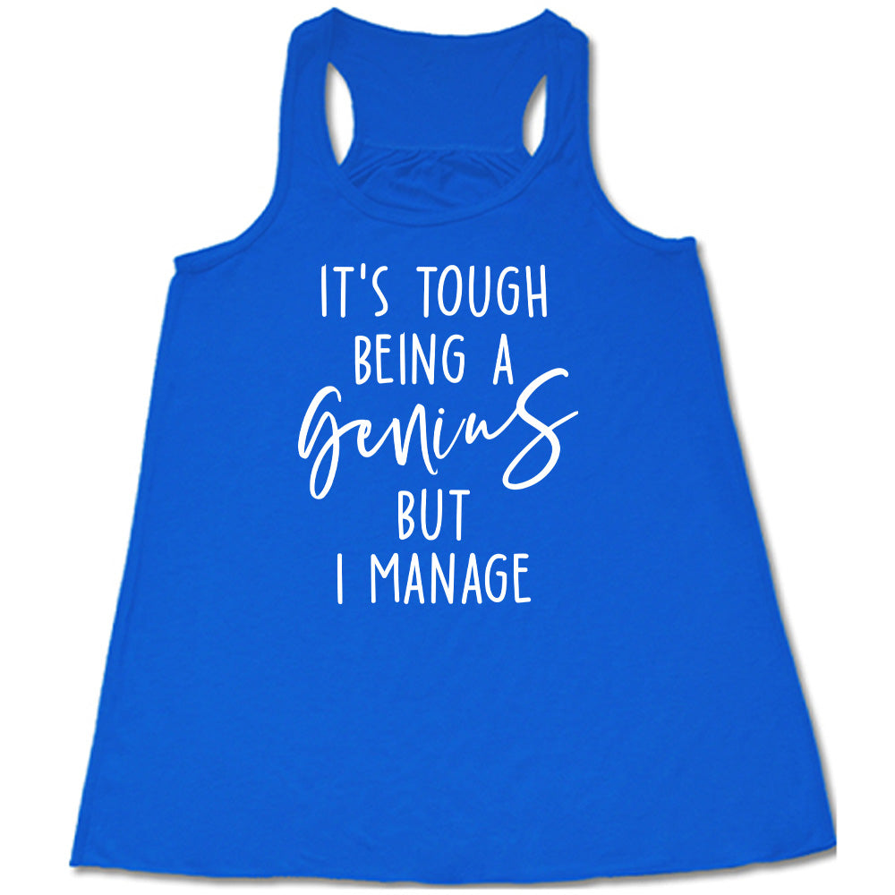 Blue colored flowy tank with graphic on it that says "It's Tough Being A Genius But I Manage"