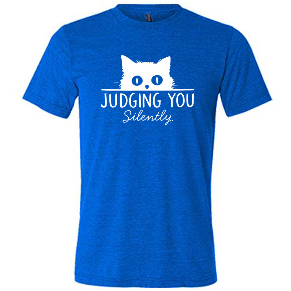 Blue colored shirt with cat graphic on it that says "Judging You Silently"