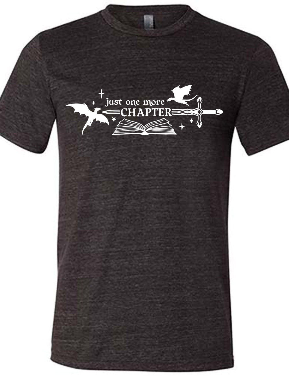 black unisex tee with the graphic of an open book, with stars and a couple dragon silhouettes, and a sword, and the words "just one more chapter" on it, with the word "chapter" overlaying the sword