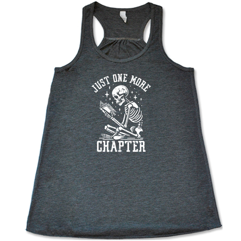 grey shirt with the text "Just One More Chapter" on it