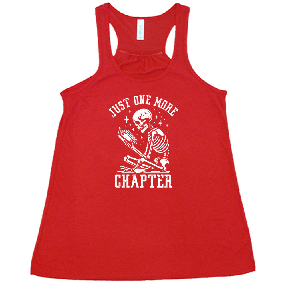 red shirt with the text "Just One More Chapter" on it