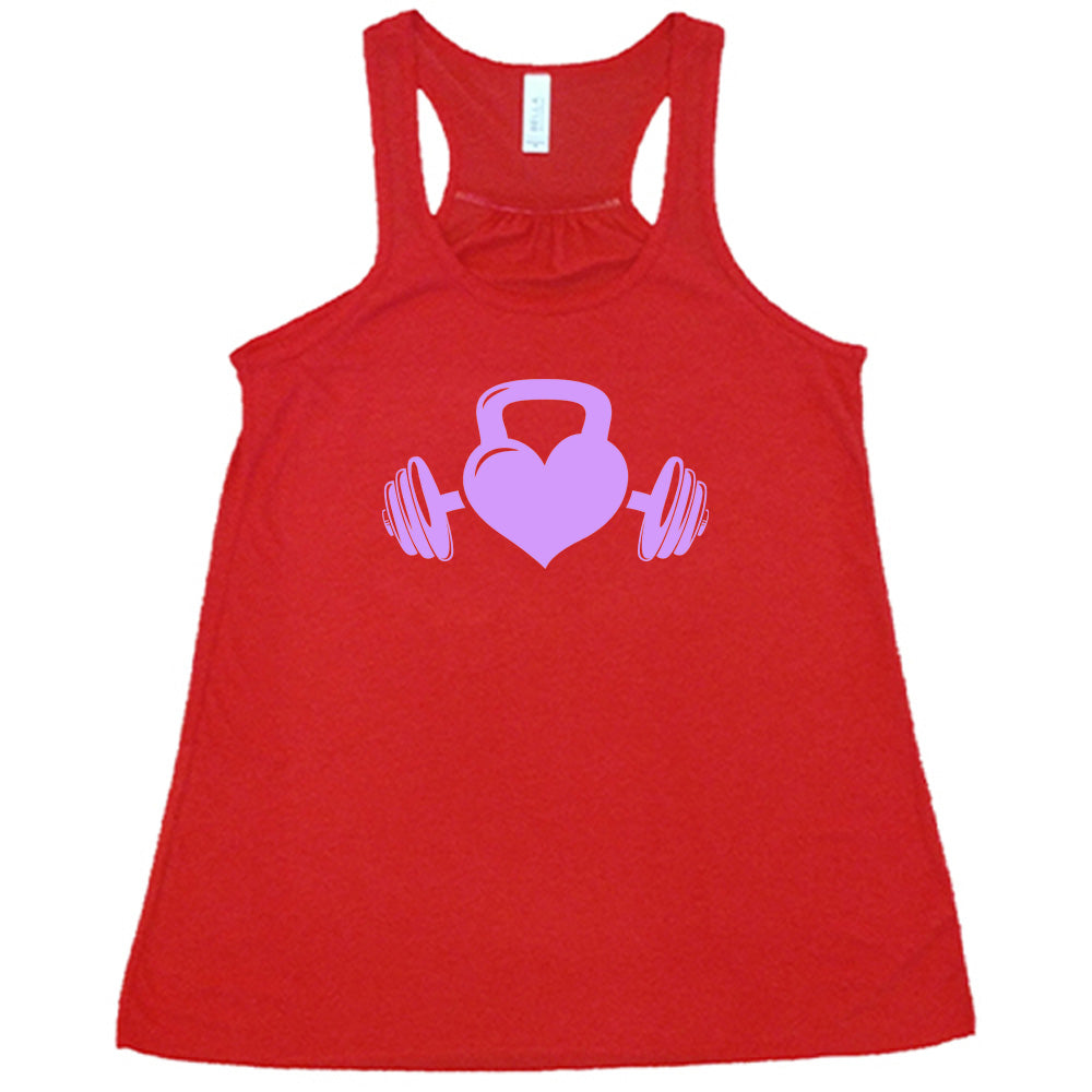 red shirt with a light purple Kettlebell Heart graphic on it