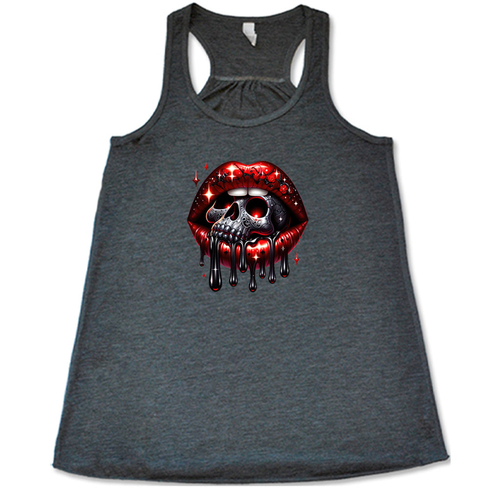 grey shirt with a skull and lip graphic on it