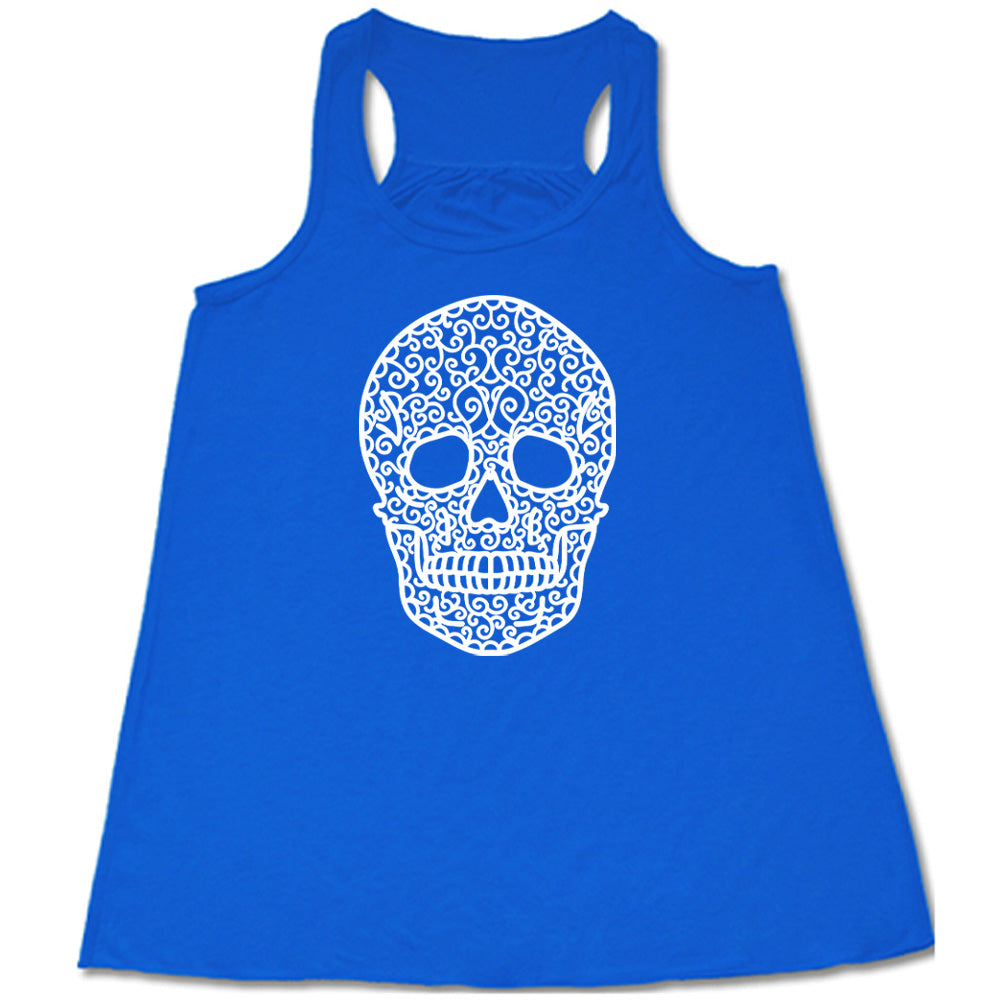blue flowy tank with the graphic of a large lacy skull