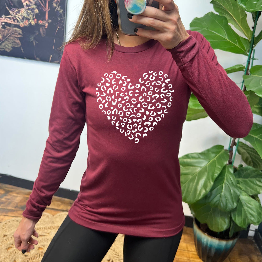 heather cardinal long sleeve shirt with the graphic of a large heart made up of leopard print