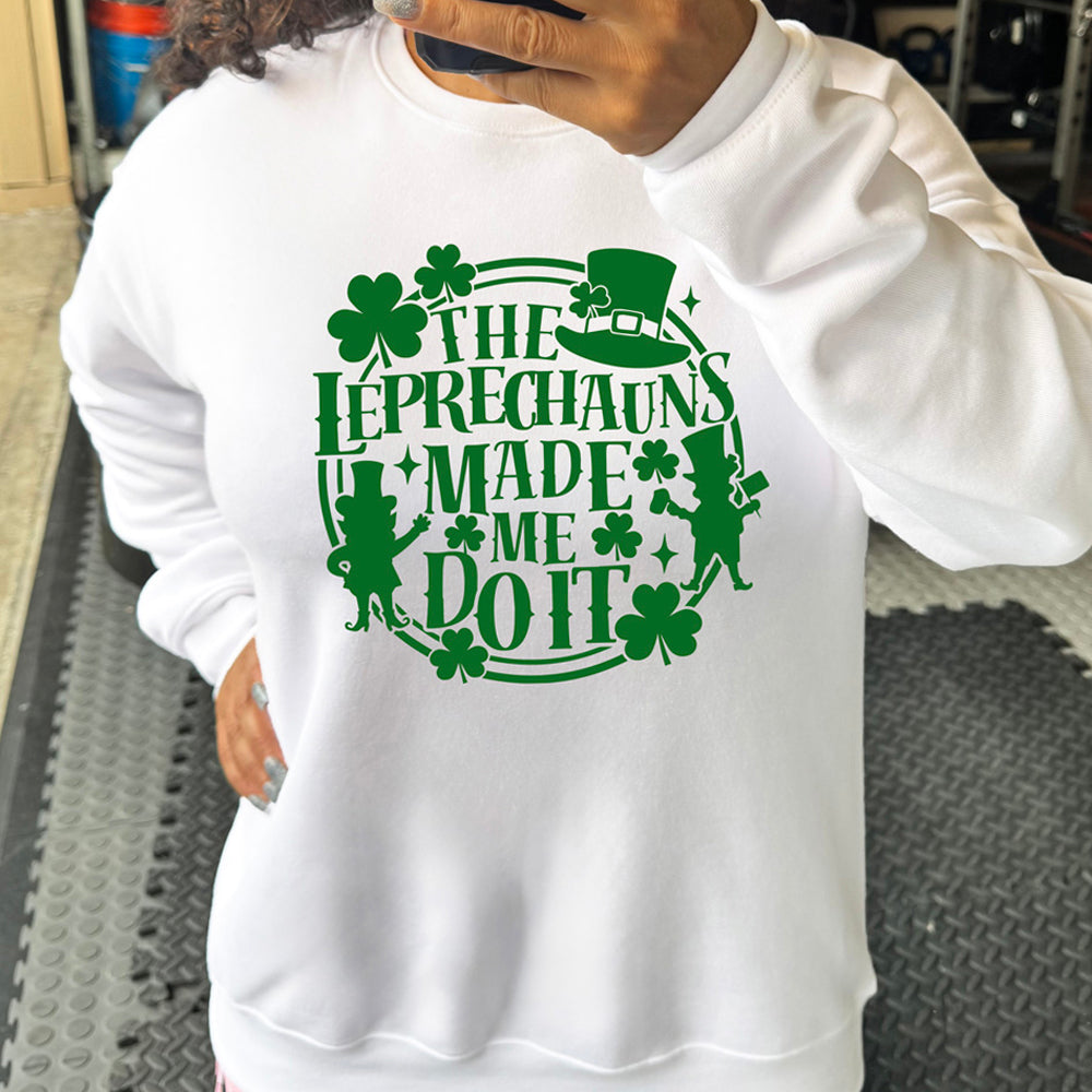 close up of our white crewneck with the quote "Leprechauns Made Me Do It" on it