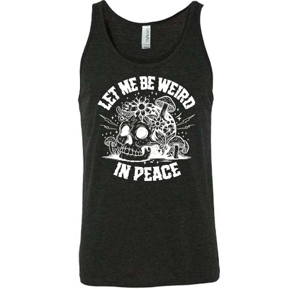 black unisex tank with the words "let me be weird in peace" on it with the graphic of a skull on the ground with mushrooms growing on and around it, as well as flowers growing on it, surrounded by little stars and lightening bolts