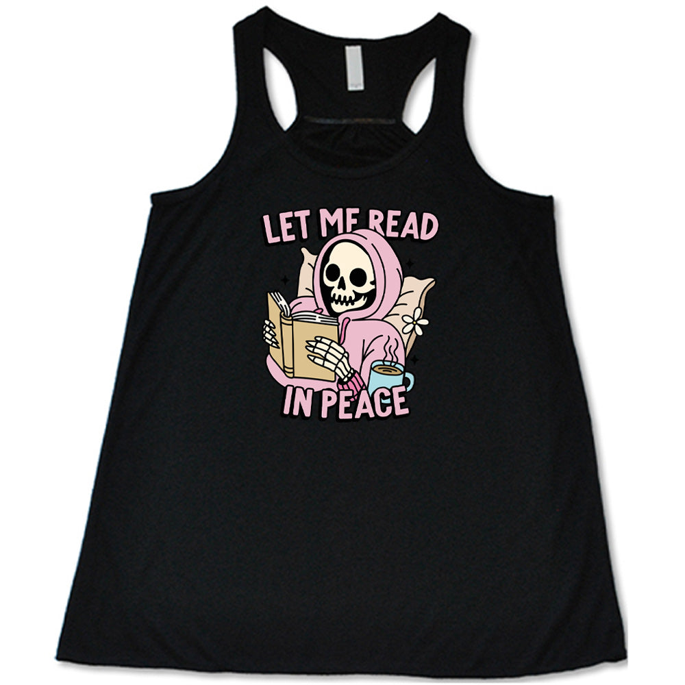 black shirt with the text "Let Me Read In Peace" and a skeleton reading graphic on it