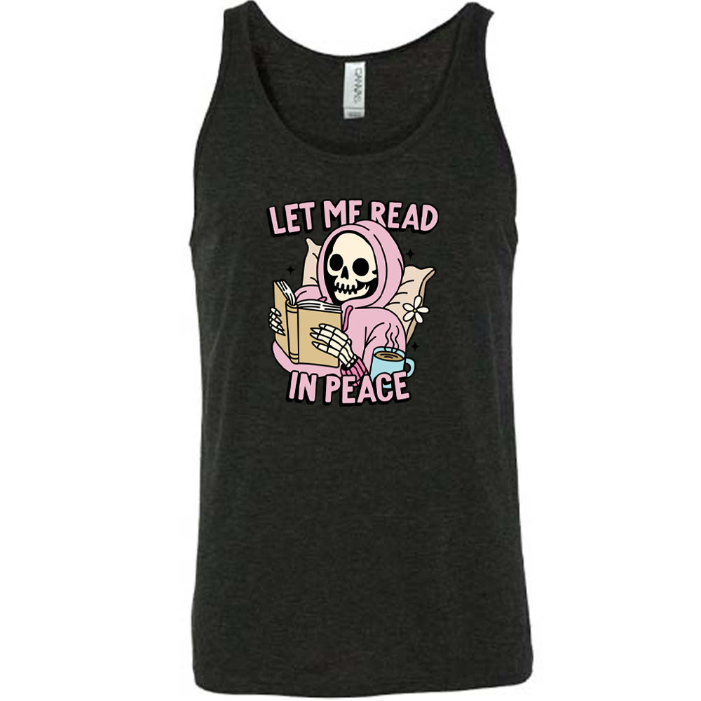 black shirt with the text "Let Me Read In Peace" and a skeleton reading graphic on it