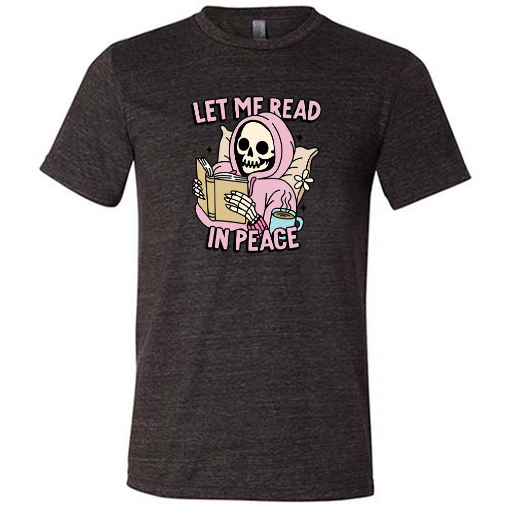 black shirt with the text "Let Me Read In Peace" and a skeleton reading graphic on it