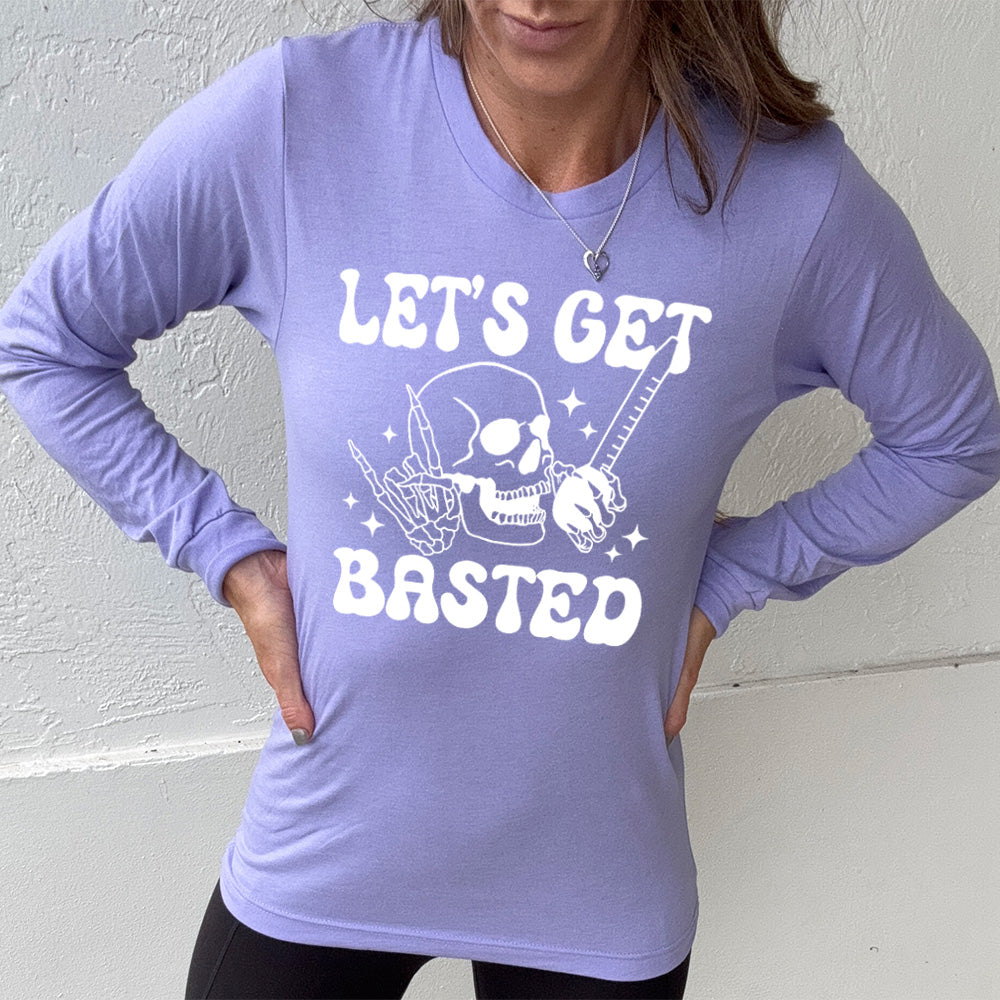 heather dark lavender long sleeve with the words "Let's get blasted" in white letter, with the image of a skull with a rocker hand and another hand holding a turkey baster