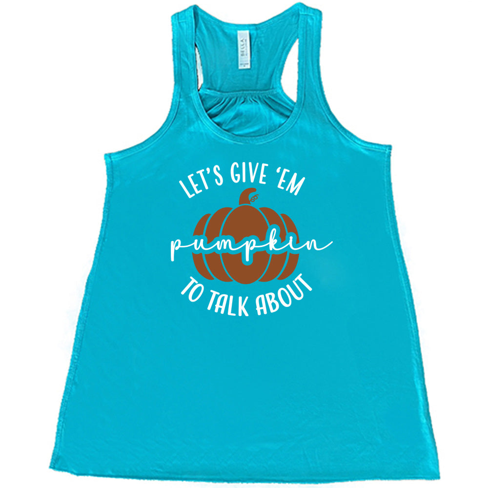 Teal colored flowy tank with pumpkin graphic on it that says "Let's Give 'Em Pumpkin To Talk About"