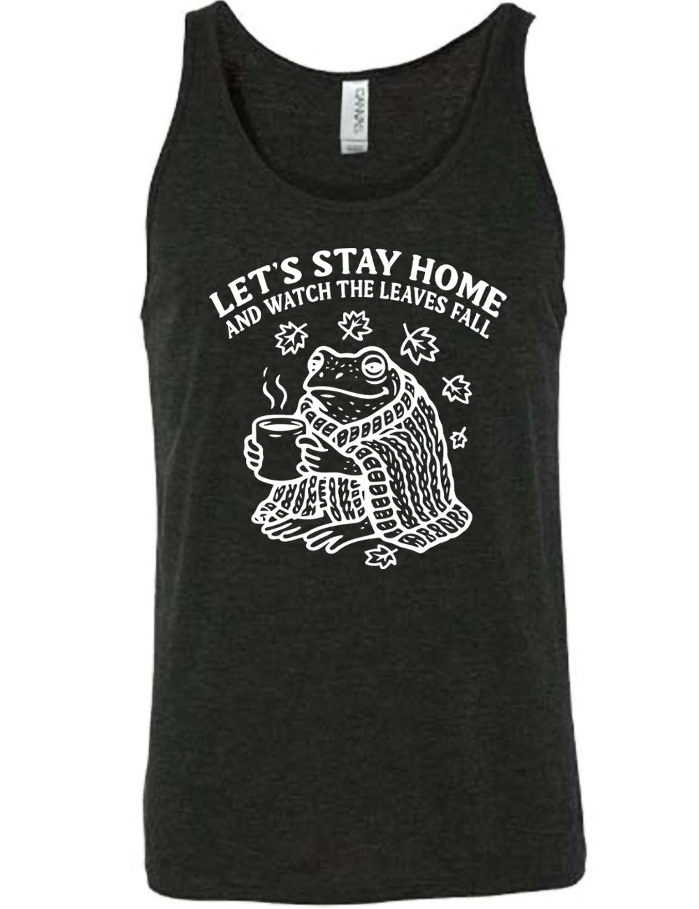 black unisex tank with the words "let's stay home and watch the leaves fall" on it, and the graphic underneath of a frog, wrapped in a blanket, holding a mug of steaming beverage, with five leaves arching over it