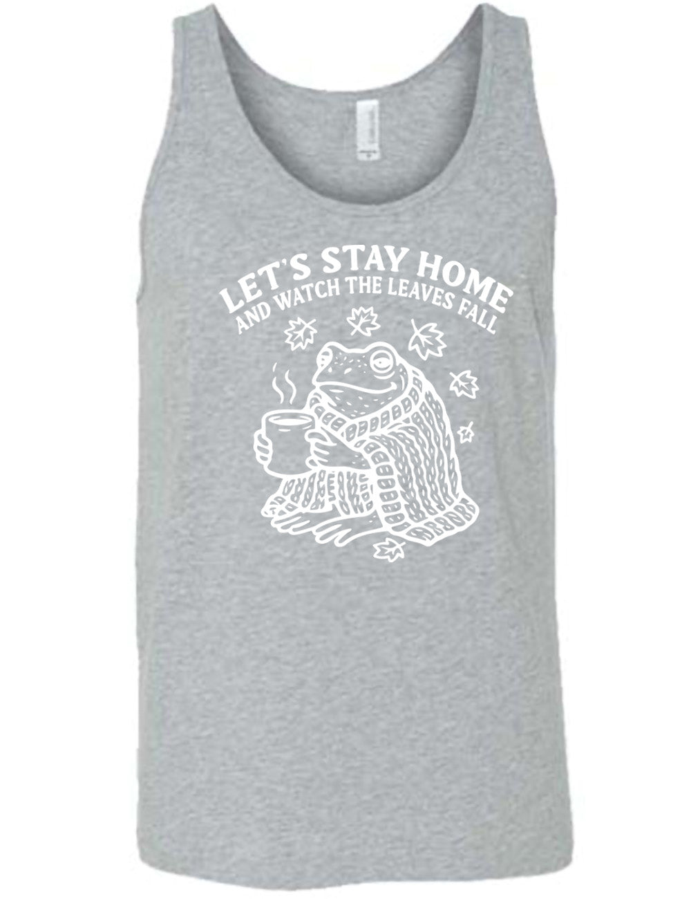 grey unisex tank with the words "let's stay home and watch the leaves fall" on it, and the graphic underneath of a frog, wrapped in a blanket, holding a mug of steaming beverage, with five leaves arching over it
