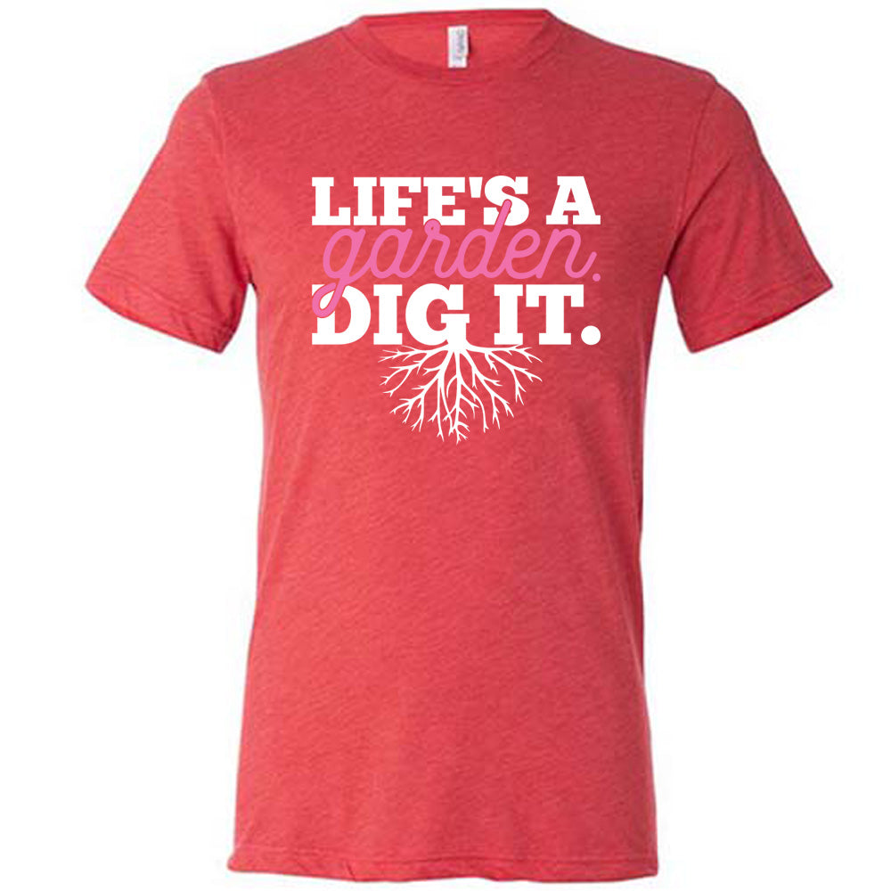 red unisex tee with the words "Life's a garden. Dig it." on it, with the "g" having roots growing down out the bottom of it