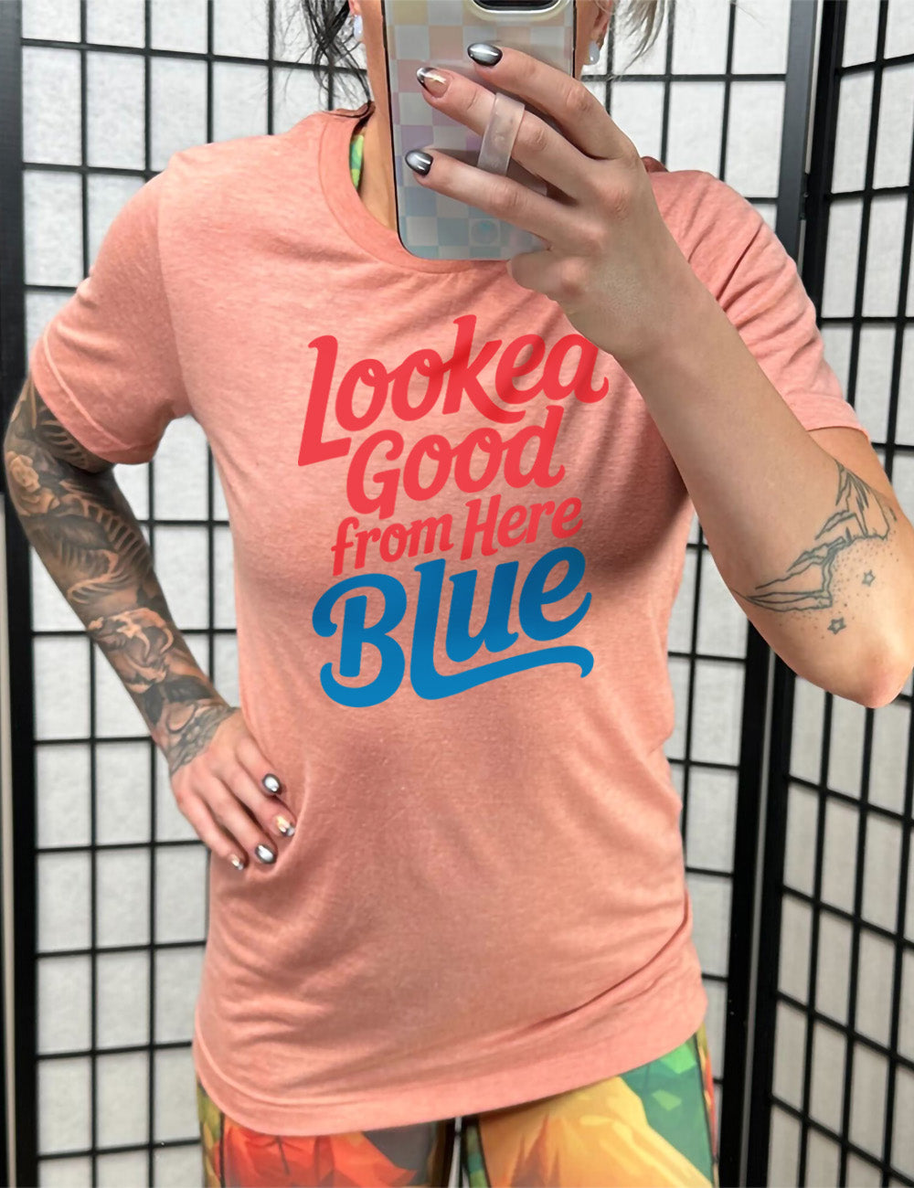 sunset unisex tee with the words "looked good from here blue" on it