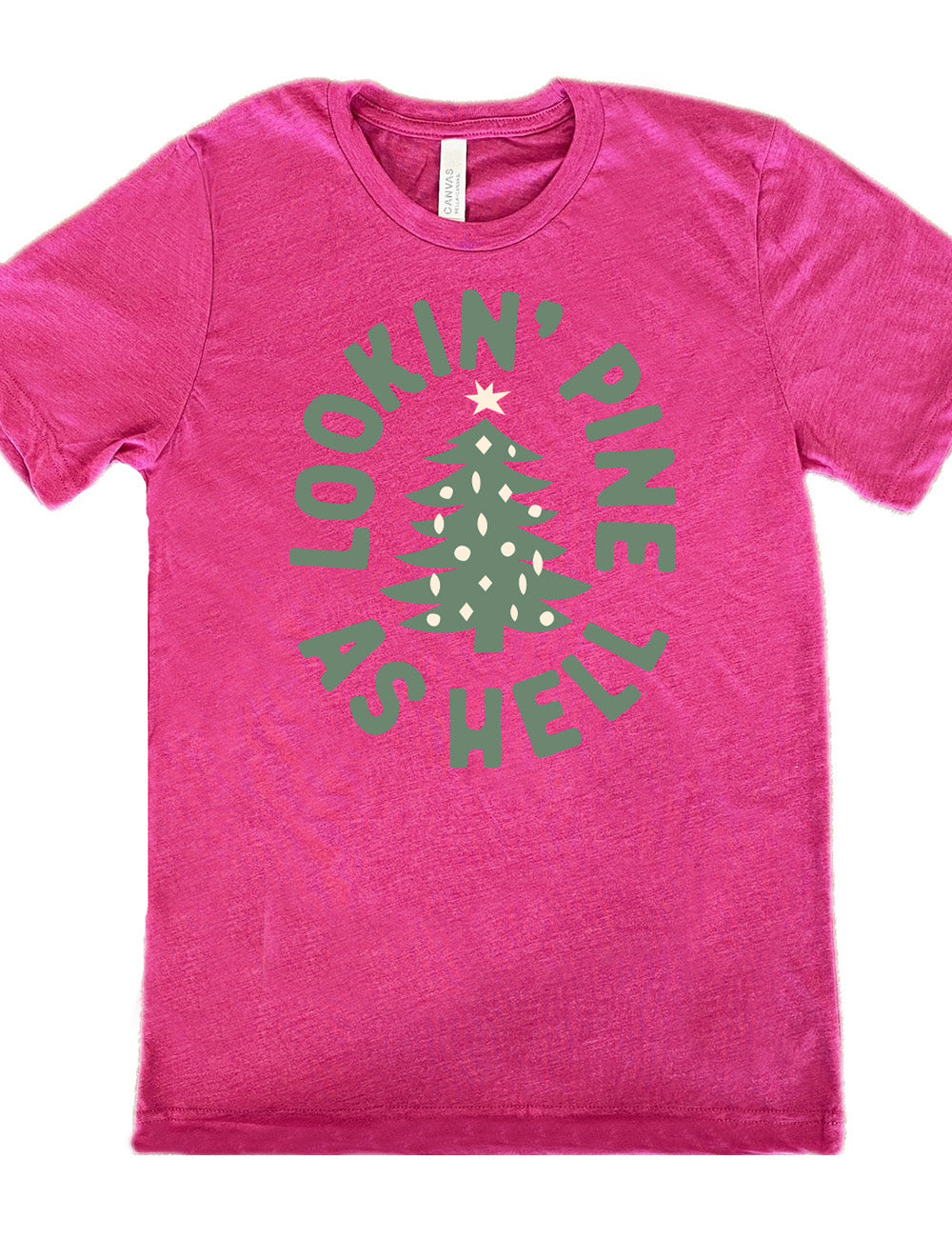 berry unisex tee with the graphic of a Christmas tree, surrounded in oval shape by words saying "lookin' pine as hell" in capital letters