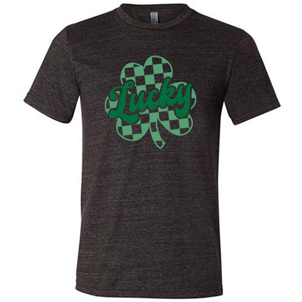 black shirt with a checkered shamrock graphic on it