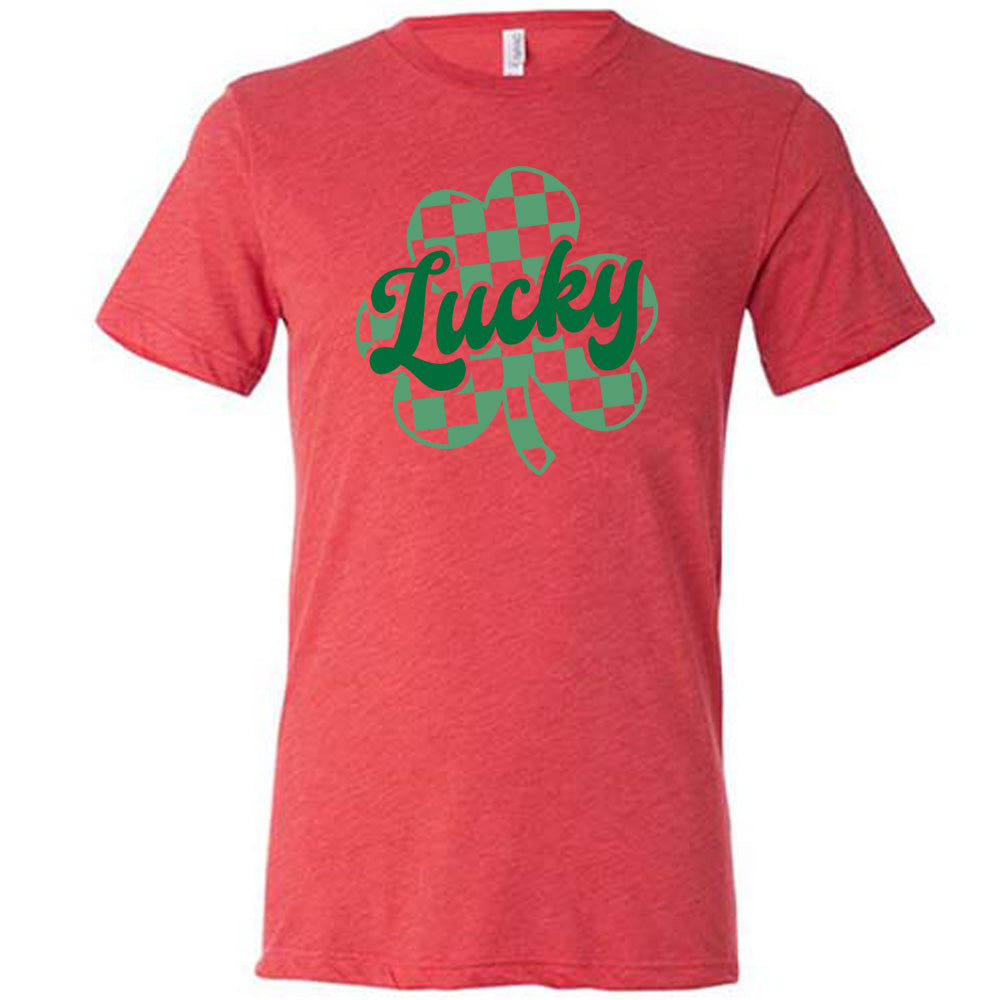 red shirt with a checkered shamrock graphic on it