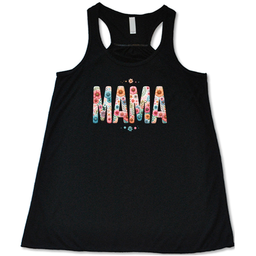 Black colored flowy tank with a floral patterned graphic on it that says "MAMA"