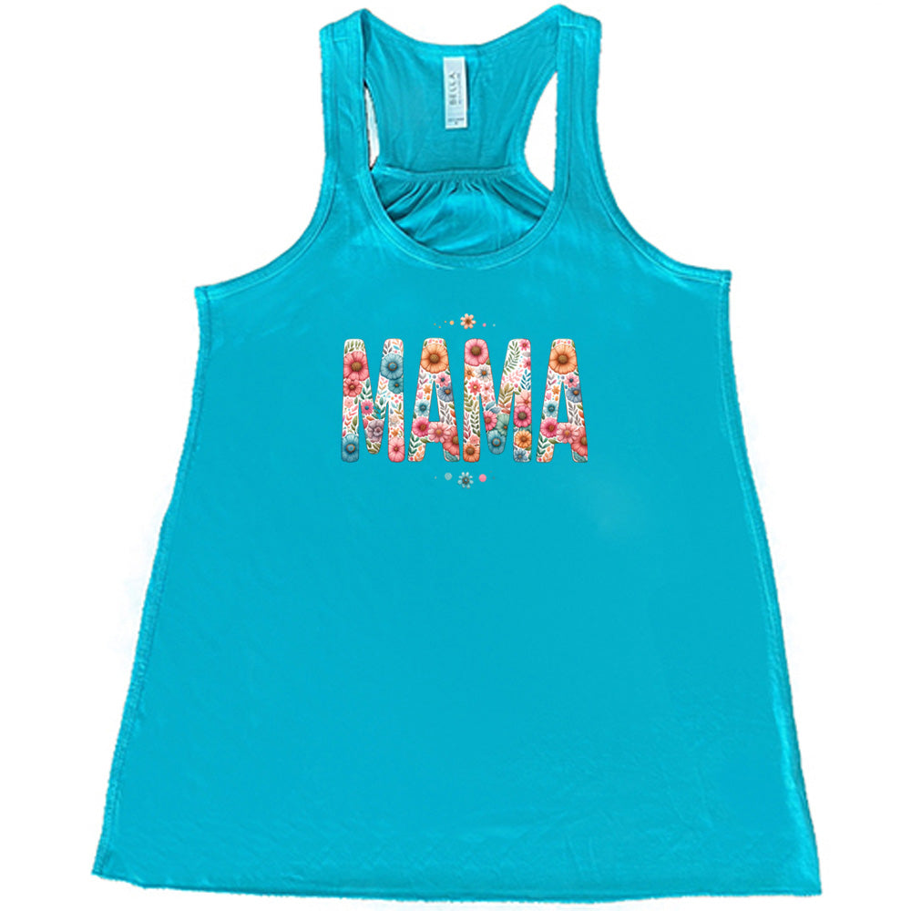 Teal colored flowy tank with a floral patterned graphic on it that says "MAMA"