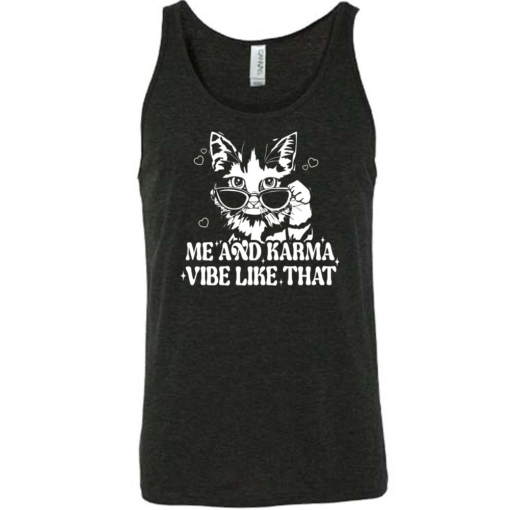 Black colored tank with a cat wearing sunglasses graphic on it that says "Me and Karma Vibe Like That"