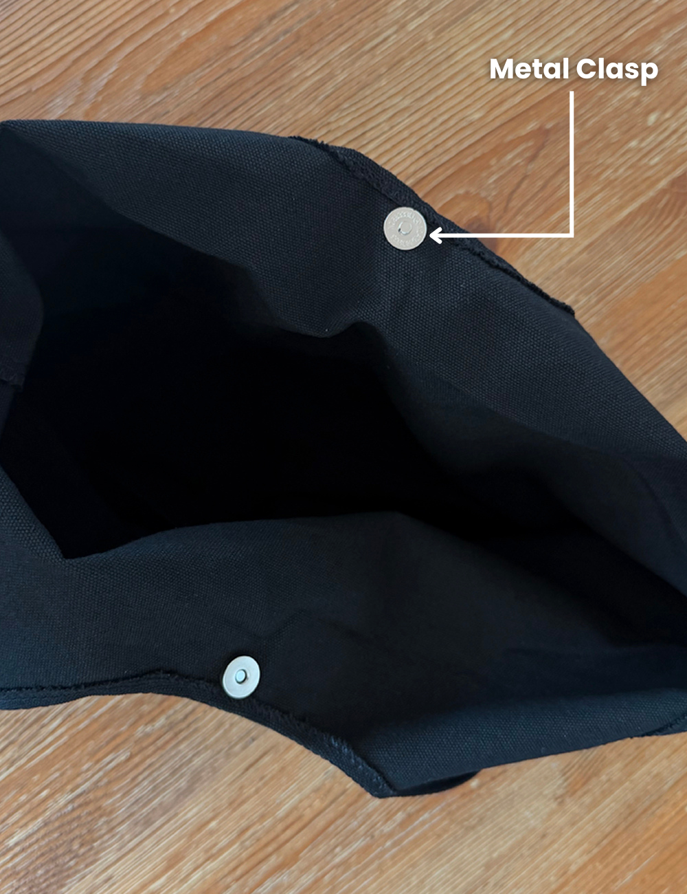 image showing metal clasps inside the tote bag to help keep it shut