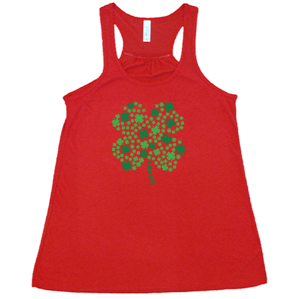 red shirt with a shamrock graphic on it