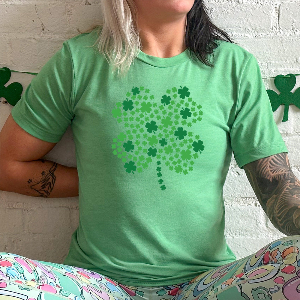 green shirt with a shamrock graphic on it