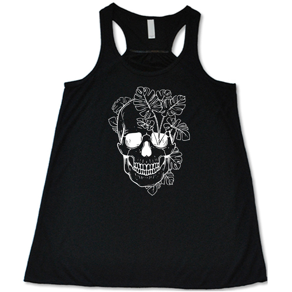 Black colored flowy tank with a monstera plant and skull graphic on it