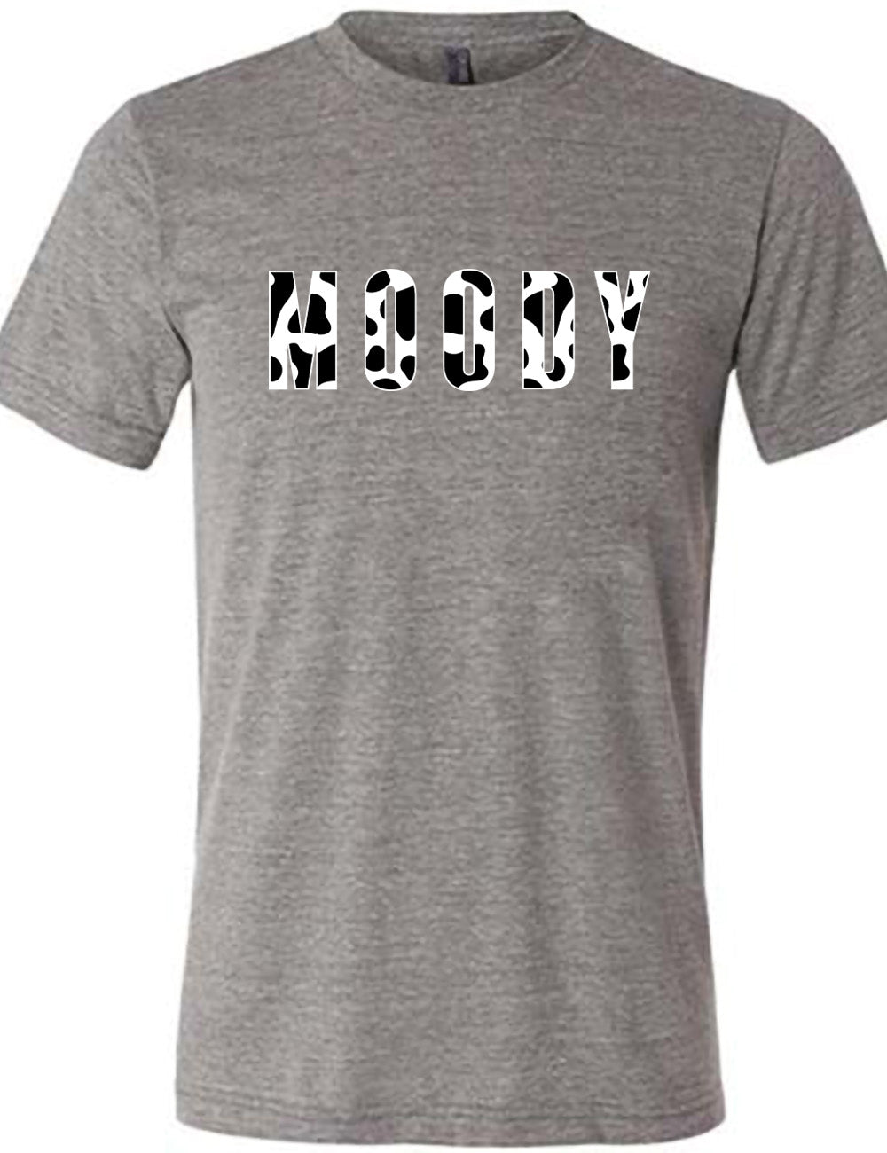 grey unisex tee with the word "moody" in all caps on it, with the font being cow print