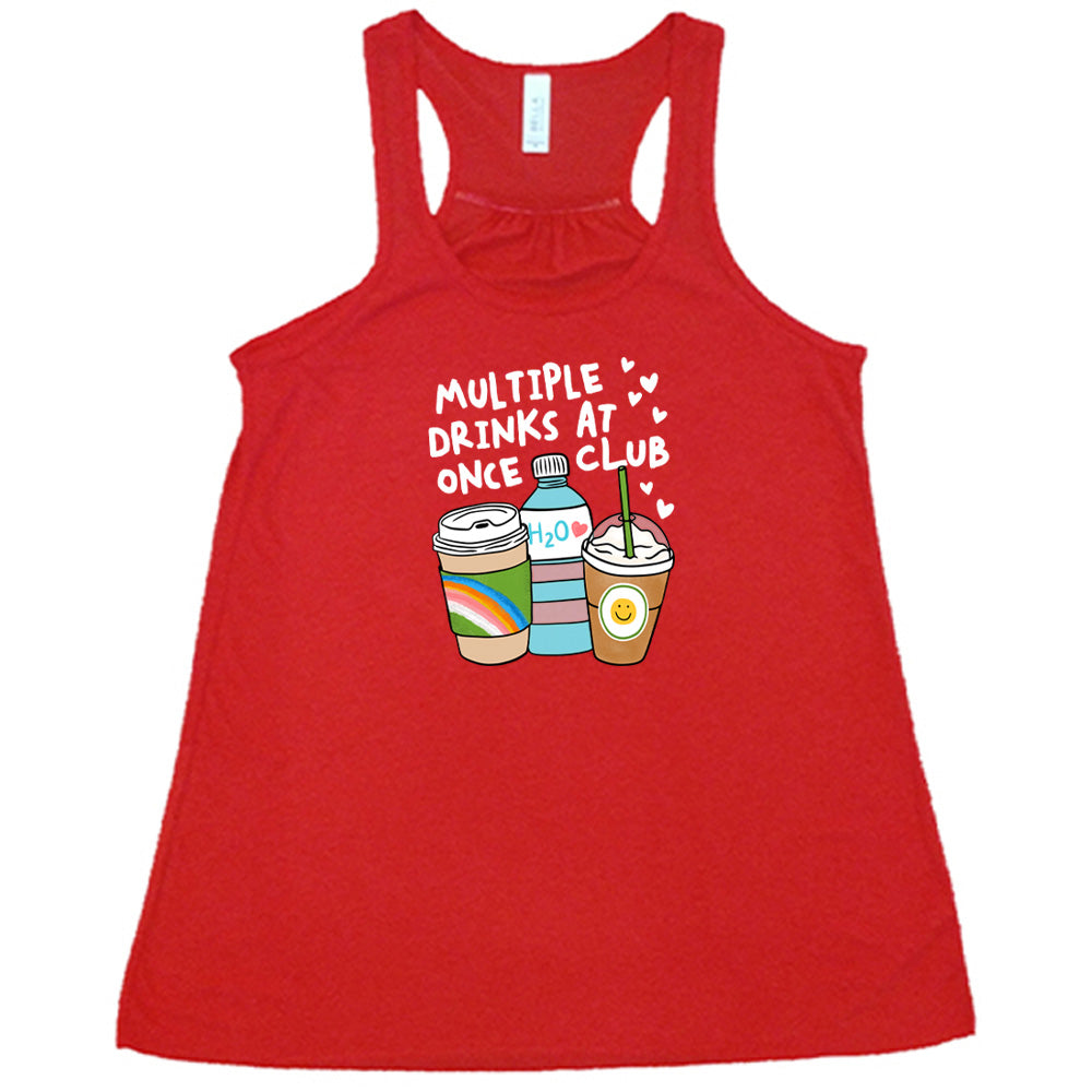 Red colored flowy tank with an assorted cup collection graphic on it that says "Multiple Drinks at Once Club"