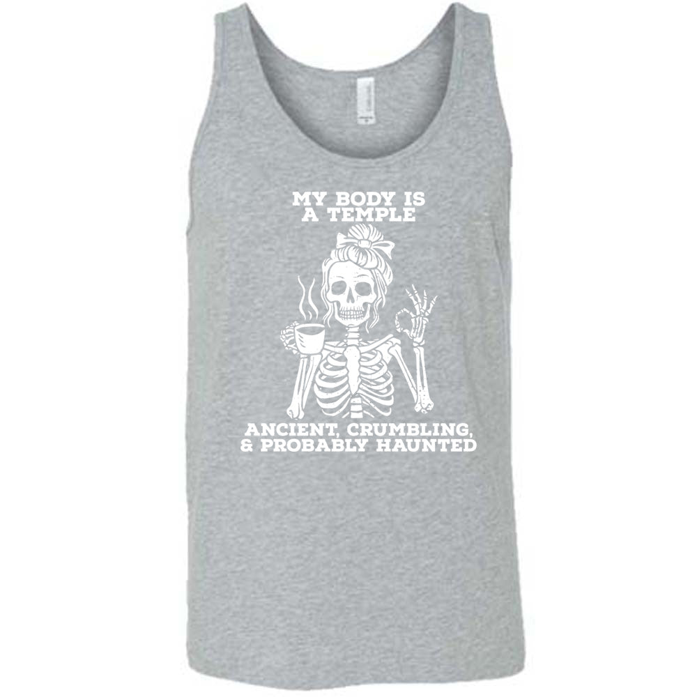grey unisex tank with the words "My Body Is a Temple Ancient, Crumbling, & Probably Haunted" on it, with the graphic of a skeleton with its hair in a bow, with one hand holding steaming coffee, and the other giving the OK symbol