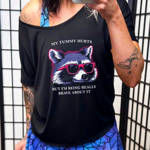 model wearing the black My Tummy Hurts But I'm Being Really Brave About It Slouchy Tee