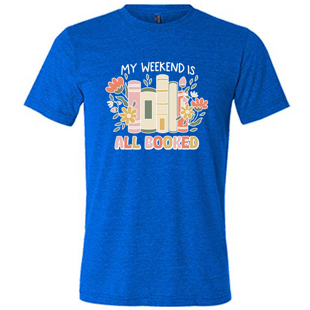 Blue colored shirt with books and flowers graphic on it that says "My Weekend Is All Booked"