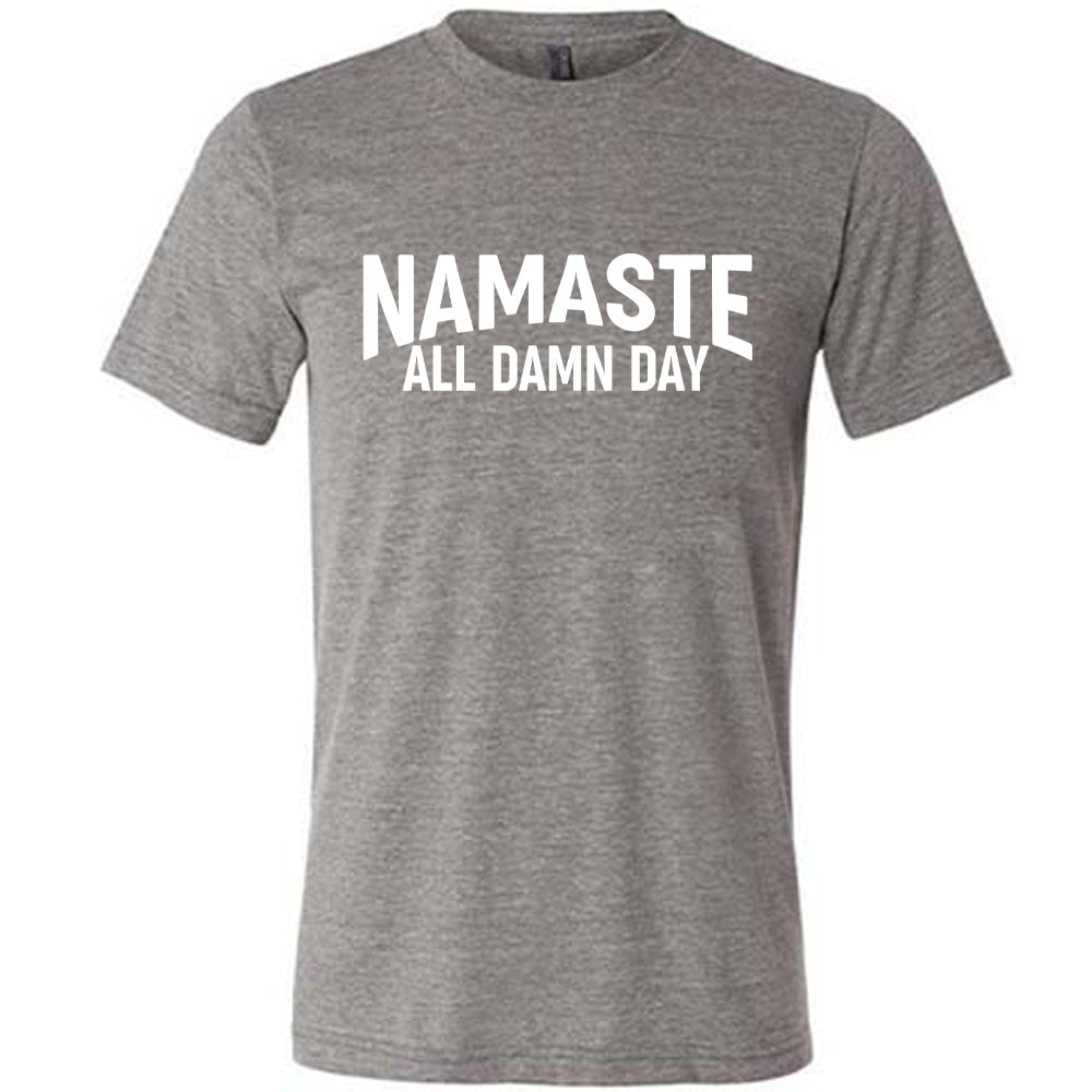 grey unisex tee with the words "Namaste all damn day" on it