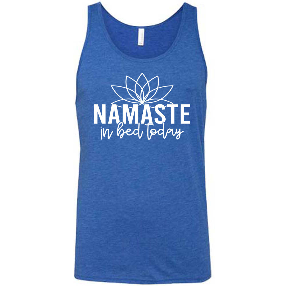 Blue unisex tank with the words "Namaste in bed today" with a line art of a lotus flower above it