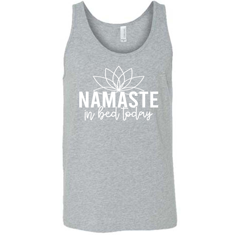 Grey unisex tank with the words "Namaste in bed today" with a line art of a lotus flower above it