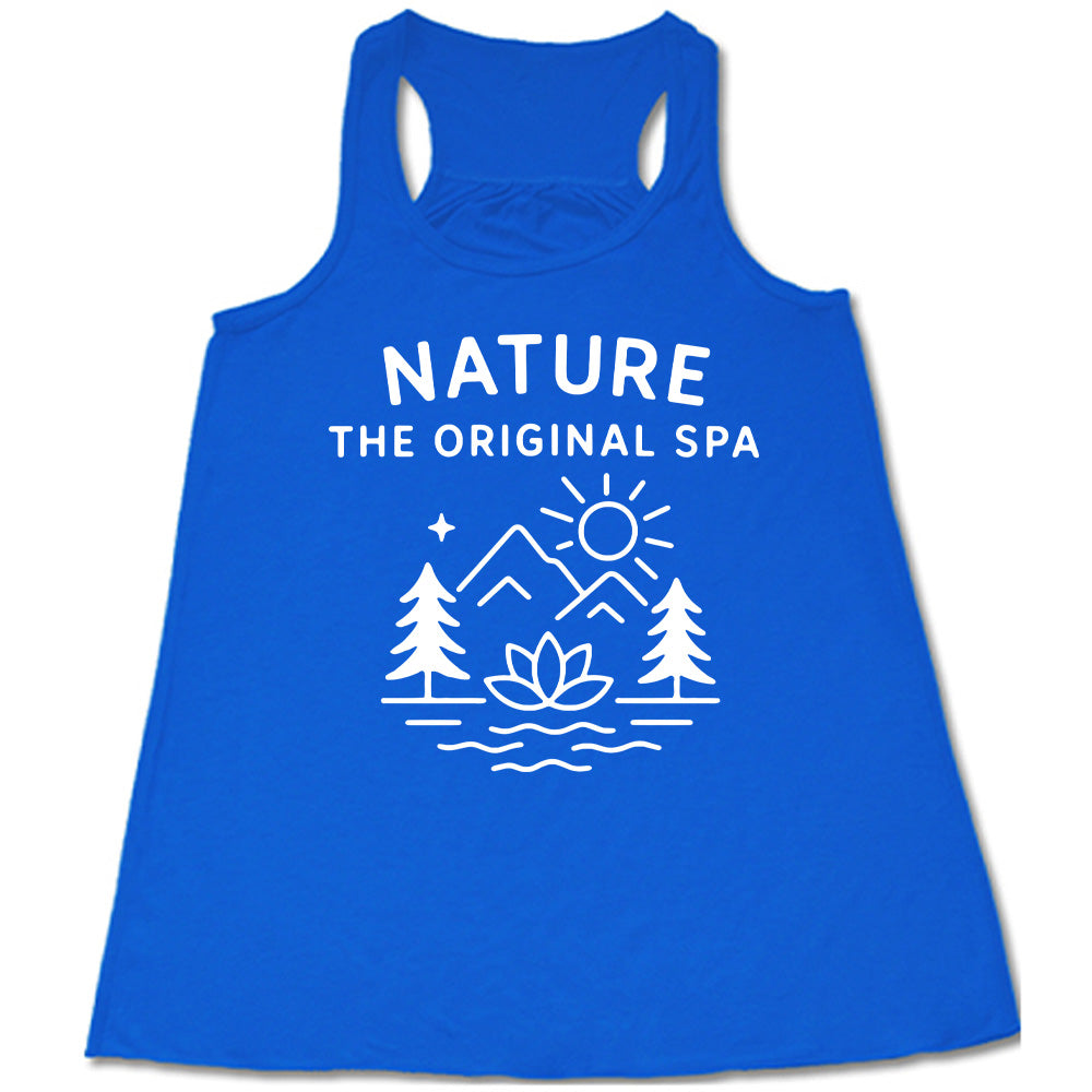 blue flowy tank with the words "nature the original spa" on it, with the mostly line-art graphic of the sun, mountains, trees, a single star, water, and a lotus flower