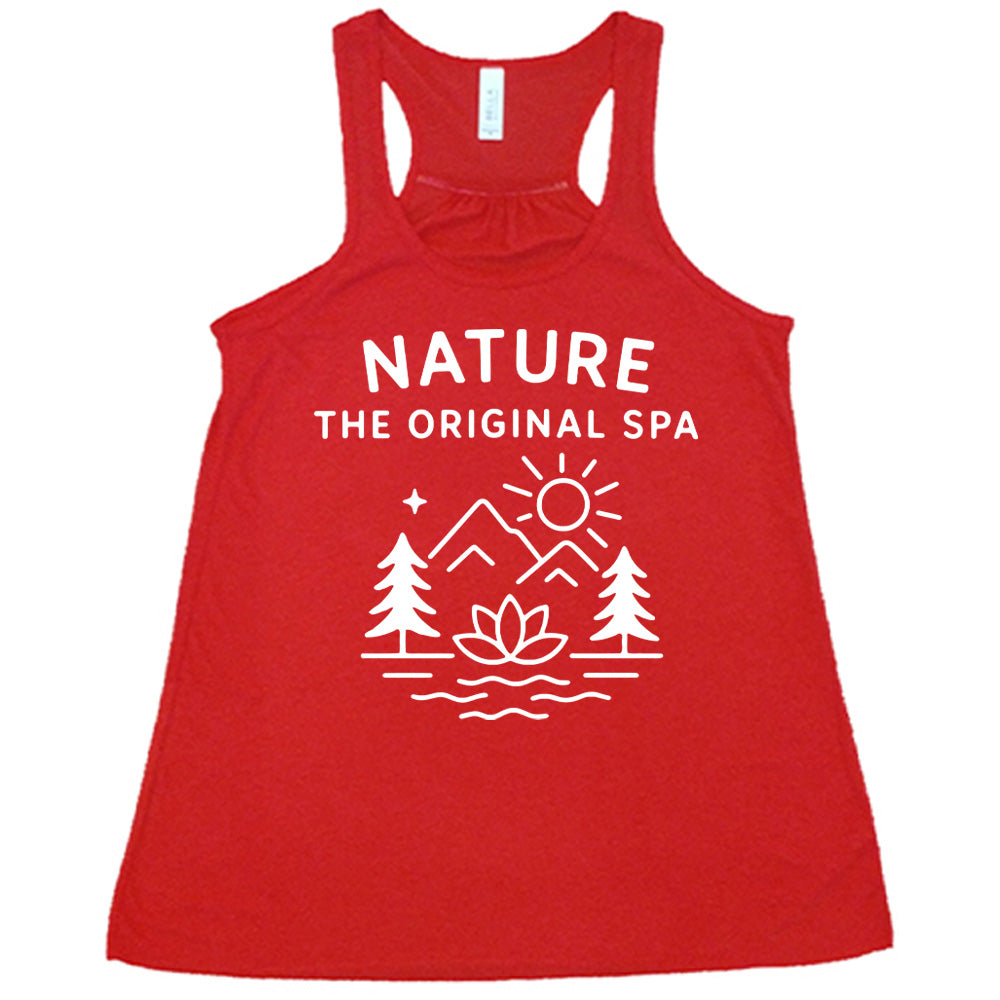 red flowy tank with the words "nature the original spa" on it, with the mostly line-art graphic of the sun, mountains, trees, a single star, water, and a lotus flower